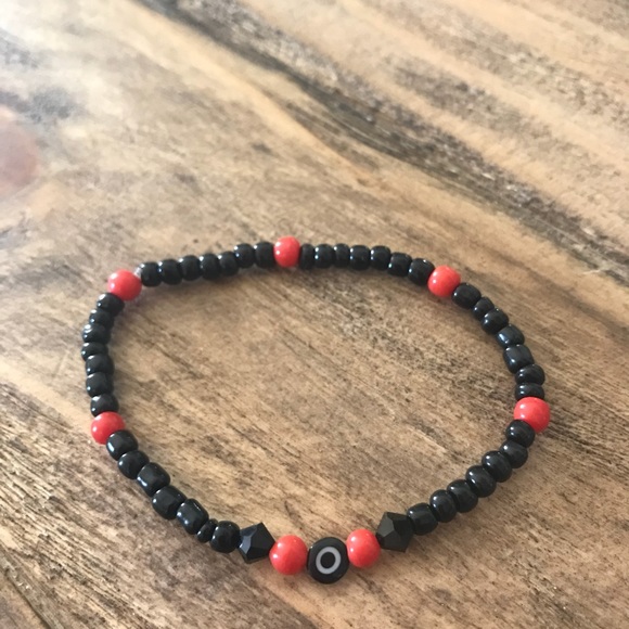 hand made Jewelry - Black bead and Red Coral bracelet.